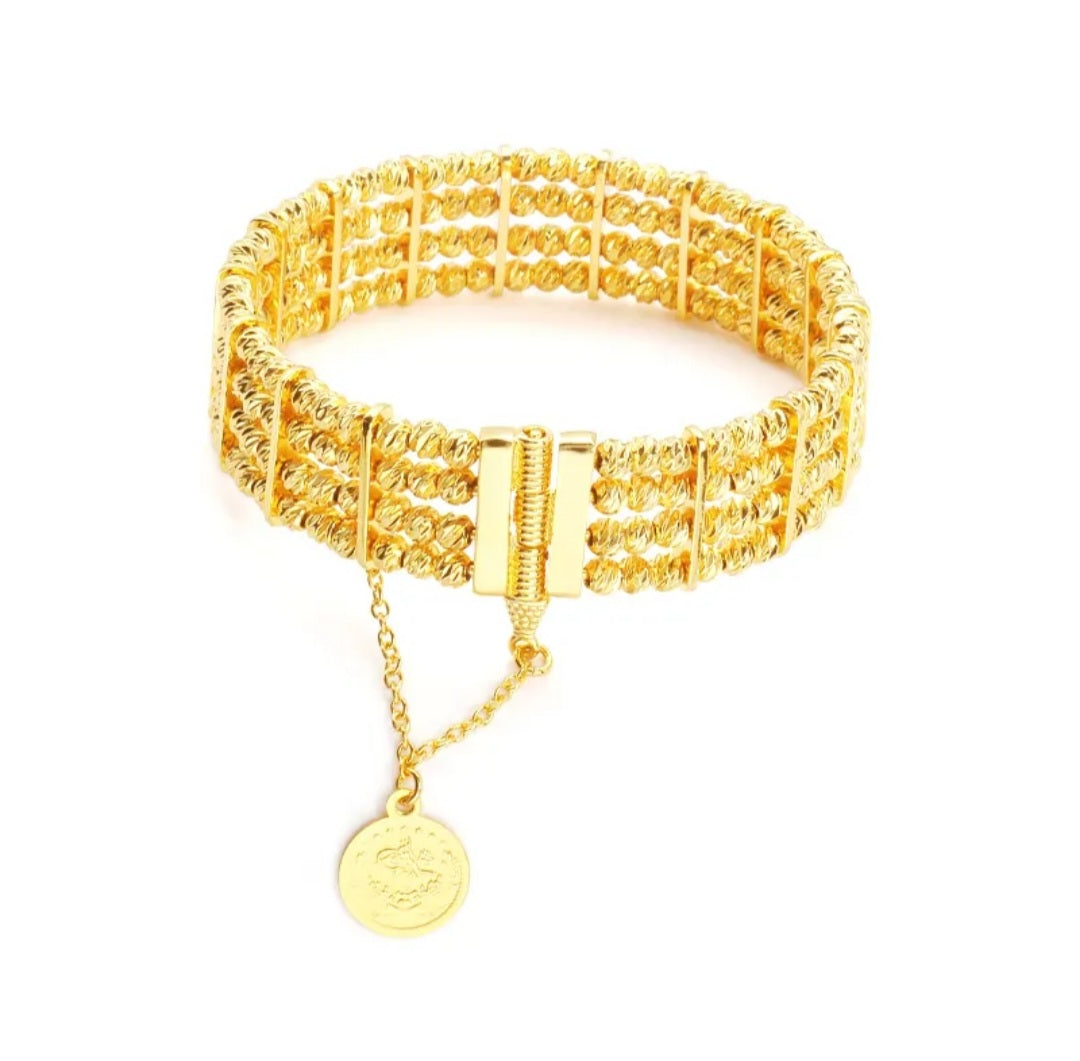 Elegantes Armband aus vergoldetem Geflecht mit Münzanhänger - König Jewelry